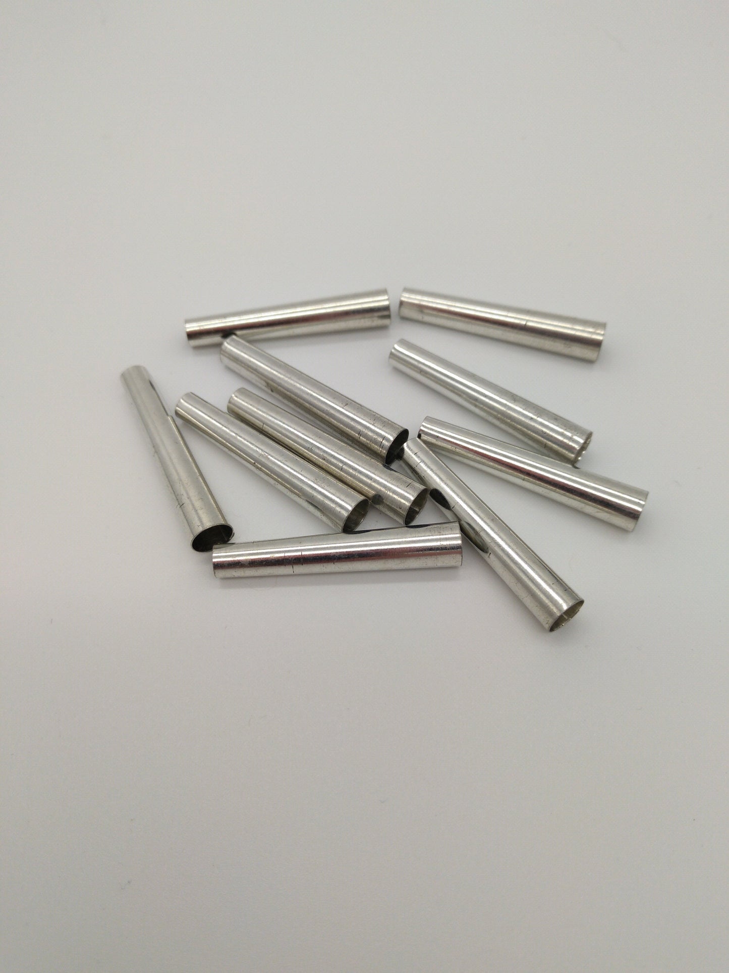 Tin Cones Polished Select packages of 20 or 50 pcs. Sizes 1 1/4", 1 1/4", and 1 3/8", Regalia, Fringes, Decorations, Jingle cones
