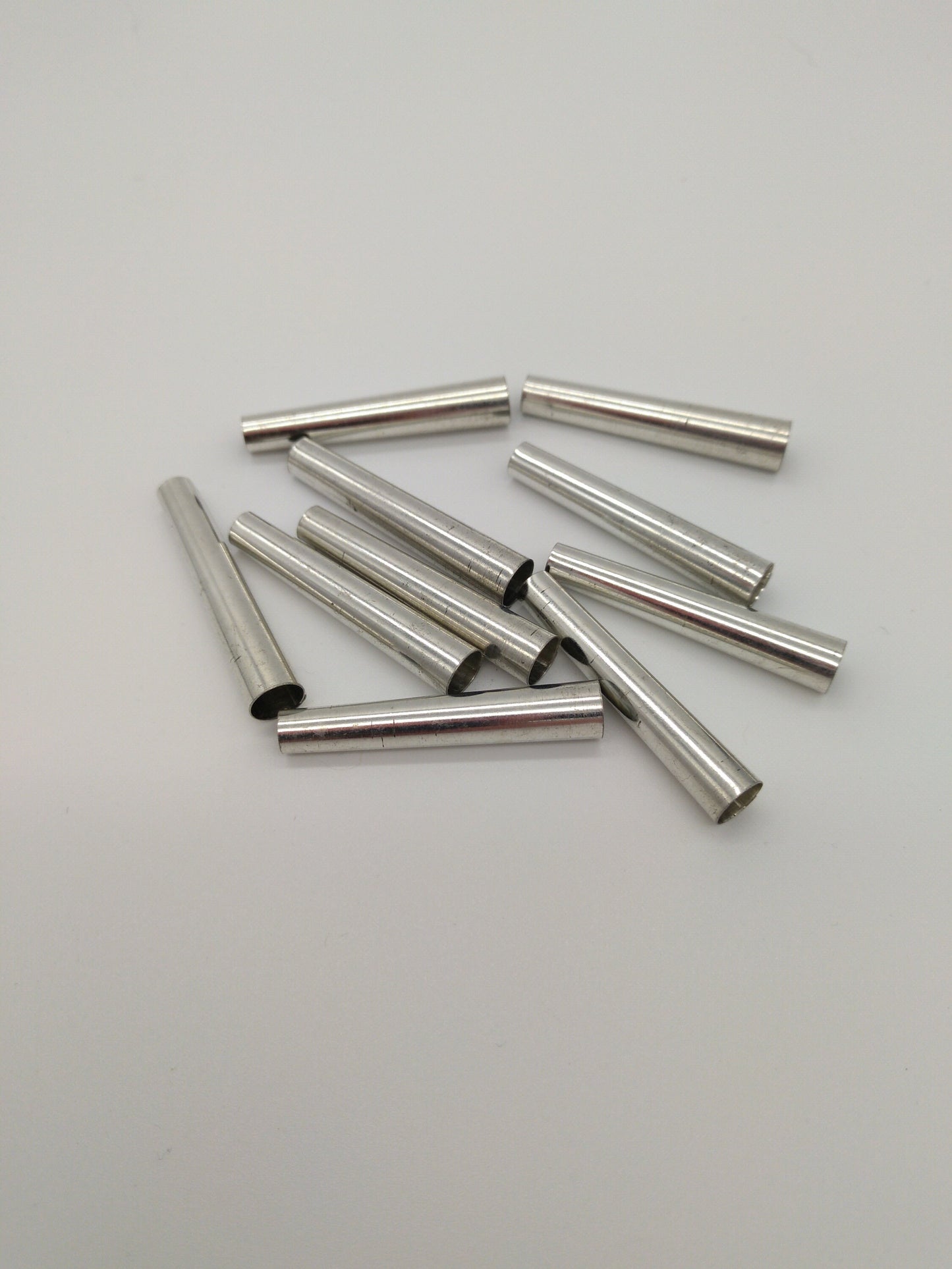 Tin Cones unpolished, Raw 1/2", 3/4", 1", and 1 1/4" packages of 20, 50, or 100, for Regalia, Trim Fringes, and sound