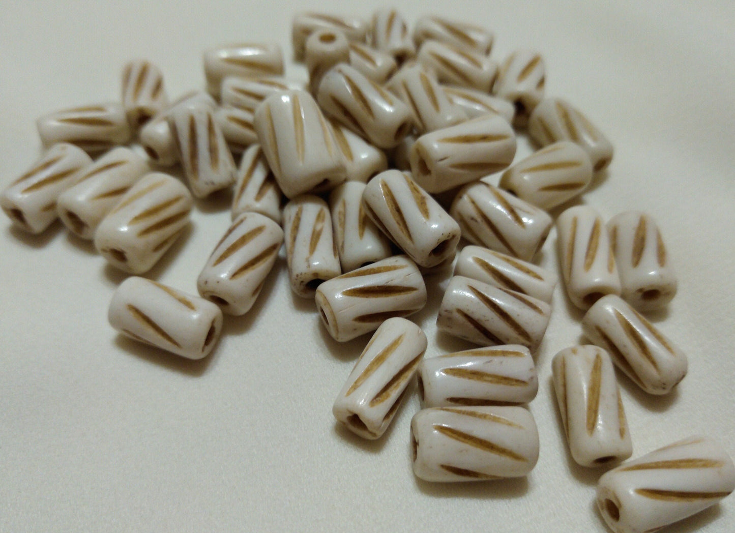 Hand carved Cow Bone Beads 6mm x 11mm  packages of 10, 20 and50 for Necklaces, Bracelets, Earrings, Chokers, Breast Plates, Arm Bands