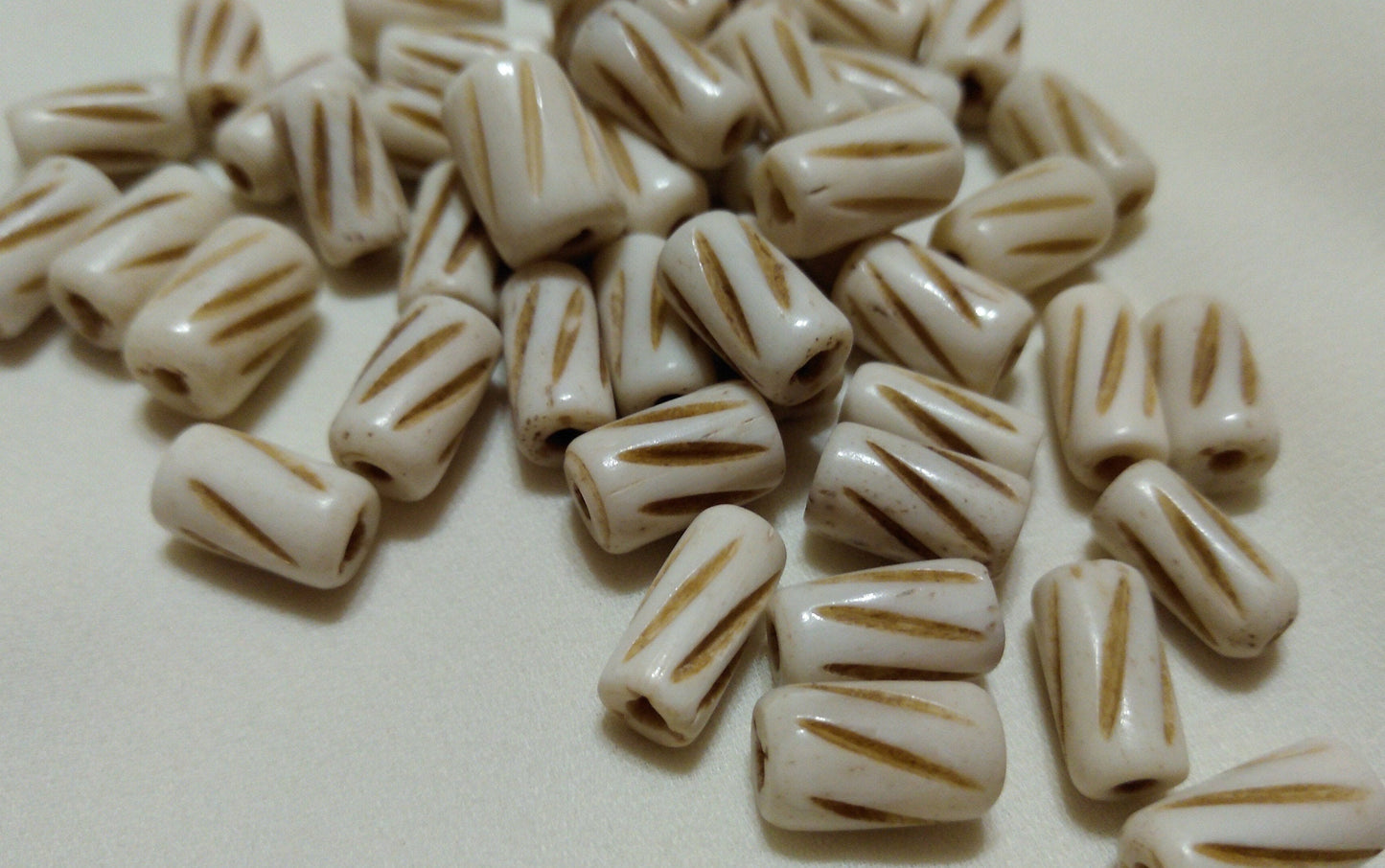 Hand carved Cow Bone Beads 6mm x 11mm  packages of 10, 20 and50 for Necklaces, Bracelets, Earrings, Chokers, Breast Plates, Arm Bands